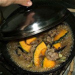 Hotful cooking of pork and pumpkin Image