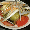 Salad of combustion eggplant and tomato Image